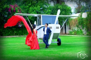 Romantic pre-wedding photoshoot of a couple in scenic outdoor location by professional photographers.