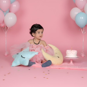 Baby photoshoot capturing adorable newborn expressions and cute moments by Alok Color Lab