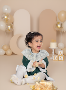 Best baby photoshoot capturing cute newborn expressions and joyful baby moments by Alok Color Lab