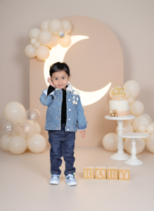 Professional baby photoshoot capturing adorable newborn and infant moments by Alok Color Lab