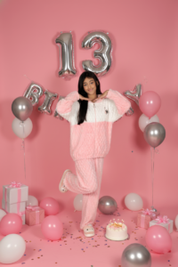 Birthday photoshoot capturing joyful celebration moments with cake, decor, and smiles by Alok Color Lab